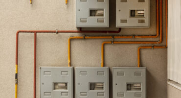 concrete-wall-with-meters-pipes